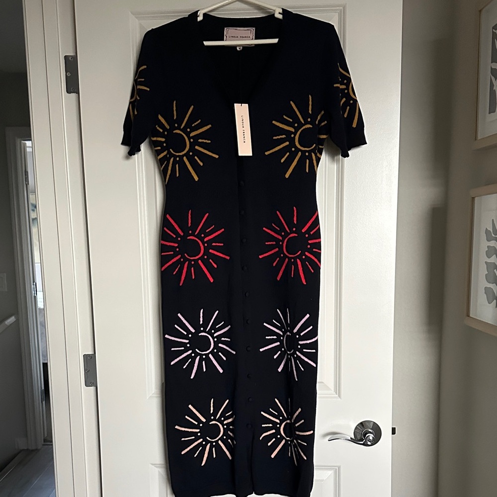 Chic Black Midi Dress with Vibrant Sunburst Patterns